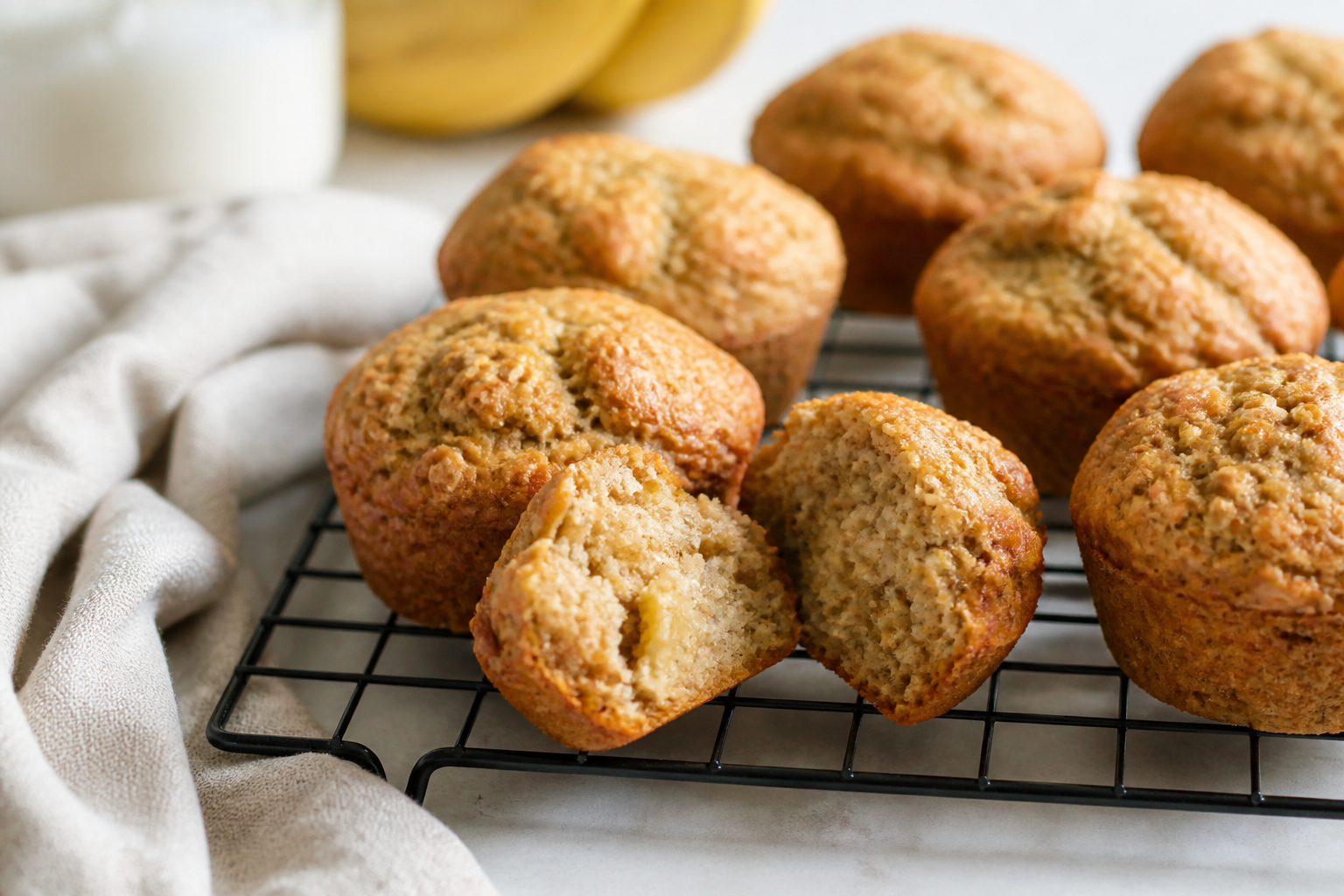 Banana oatmeal muffins on a cooling rack